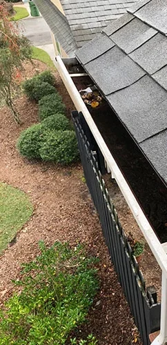 Cleared gutter and roofline after a gutter cleaning visit, debris fully removed.