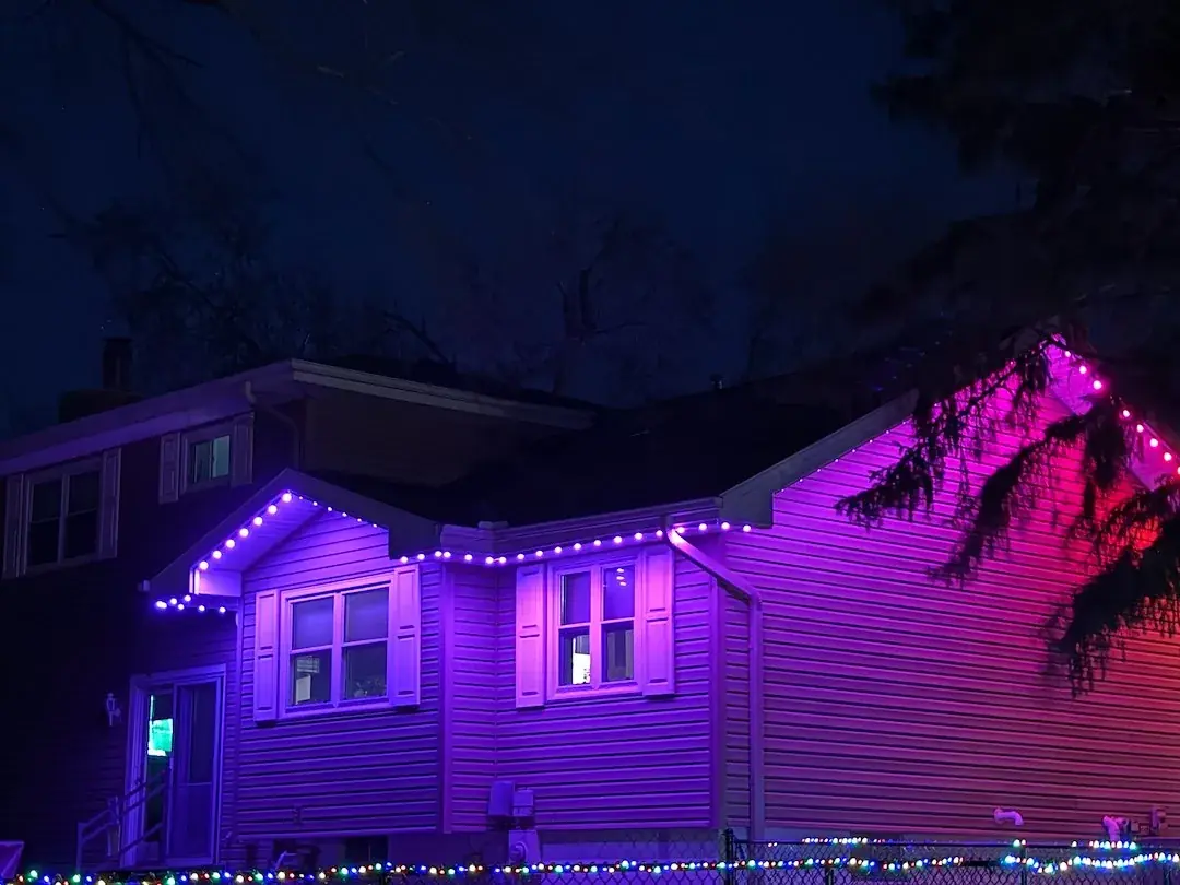 Permanent LED lights along the roofline at night